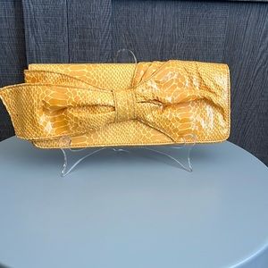 Nine West yellow leather snake print clutch with bow detail